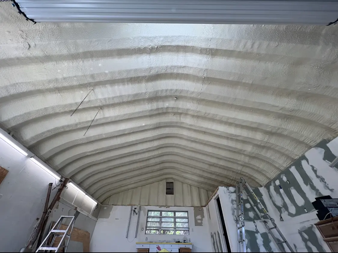 Spray polyurethane foam applied to the underside of a metal roof deck in Pahrump